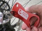 Preview: Wolf Tooth Bottle Opener With Rotor Truing Slot red